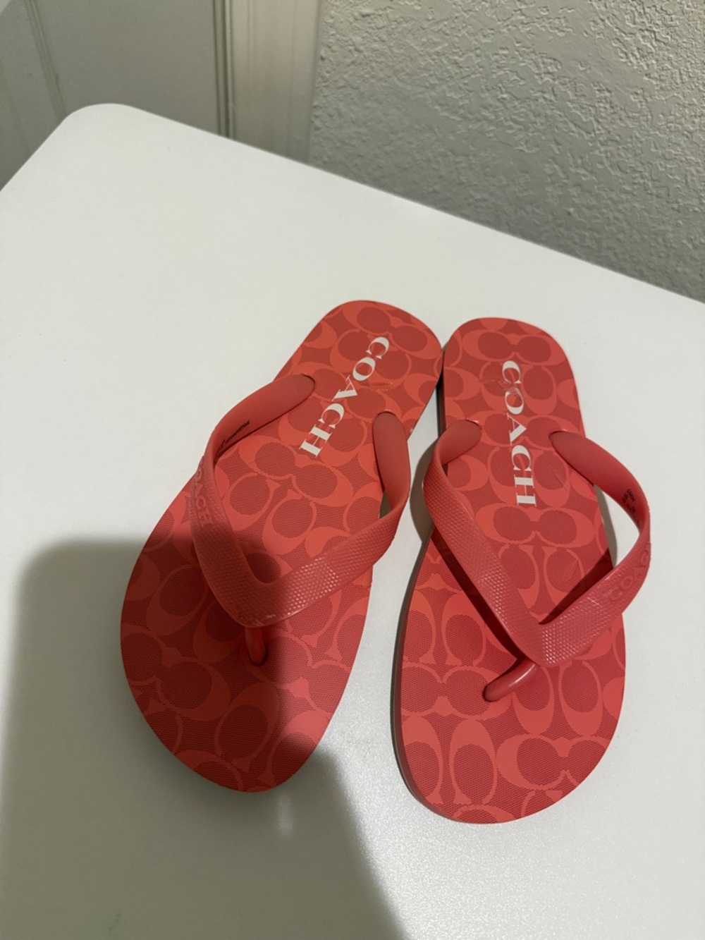 Coach Coral Logo Print Flip Flops